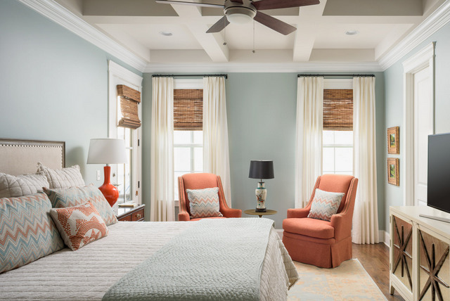 In this Chattanooga master bedroom, we opted for creamy white linen panels to evoke a quiet and restful mood. Note the woven shades here. They provide light control, privacy and some fabulous texture.