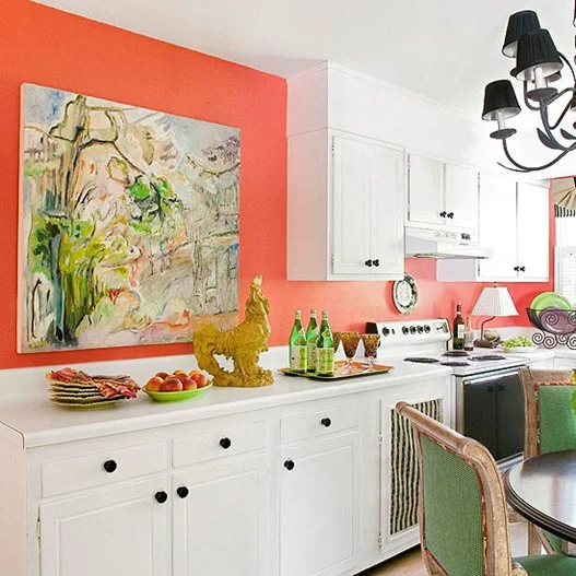 Here’s one for my color lovers (me included). The painting - which I adore - was surely the jumping off point for this unapologetically pretty kitchen. The kitchen is humble and definitely not “new” , and they certainly made the most if it!