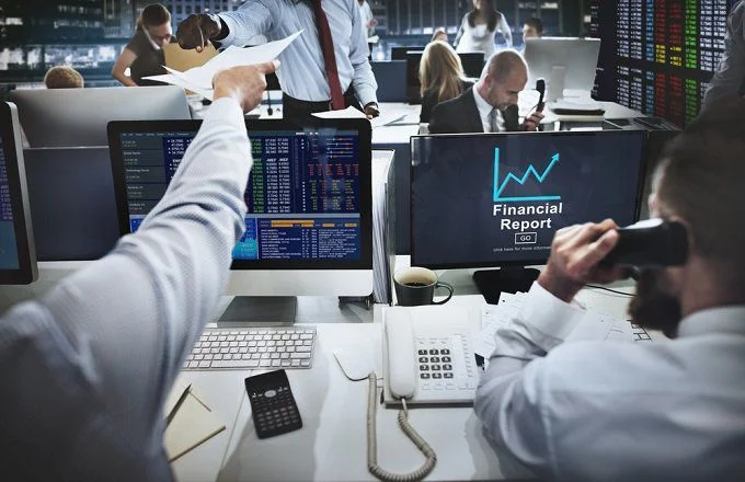 trading_broker_shutterstock_385211950-5bfc3b69c9e77c005183e69b.jpg