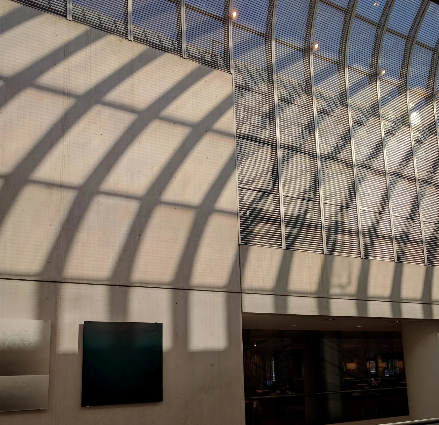Look at all the squares: window blinds, shades. black and silver artwork!