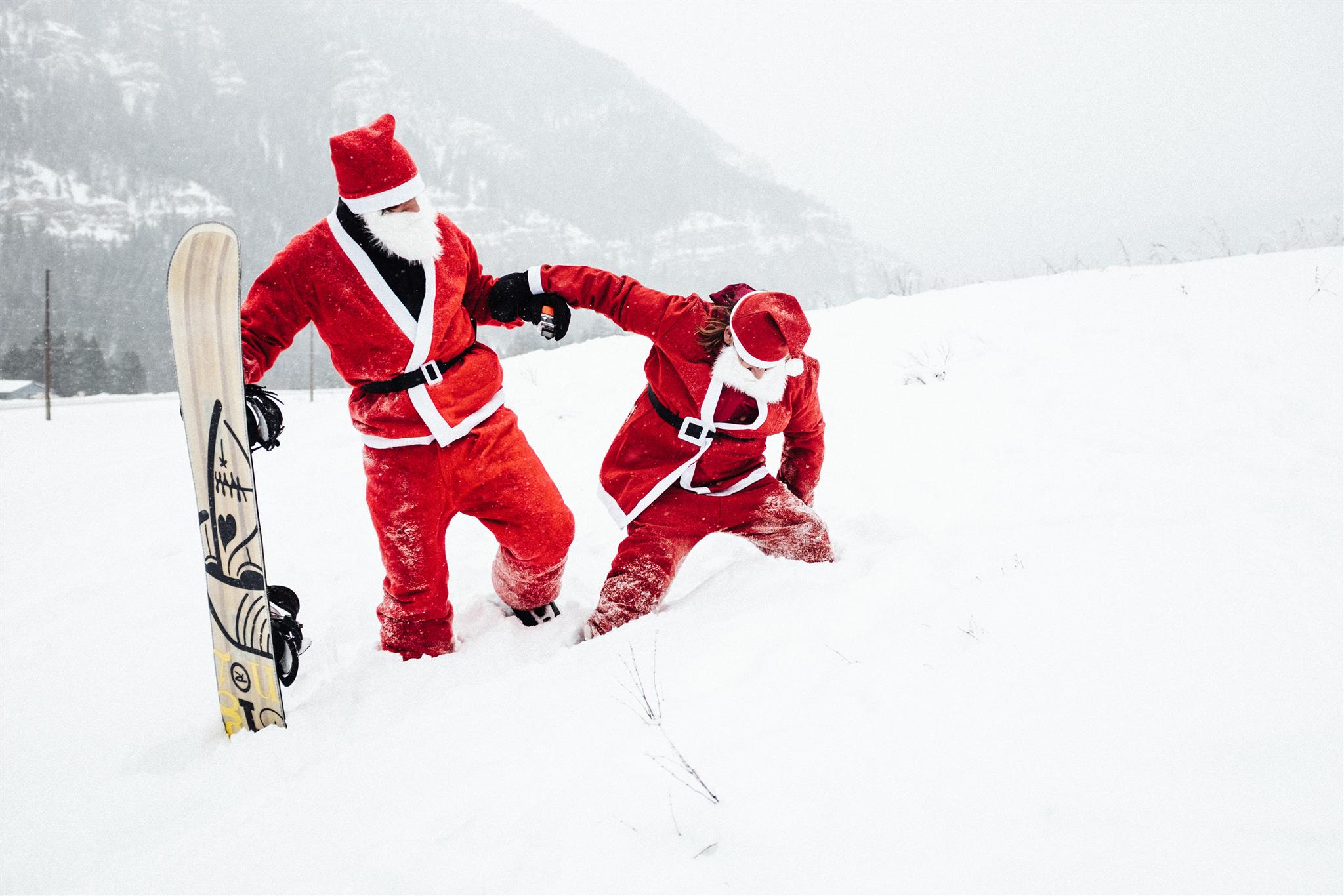 Snowboarding Santas