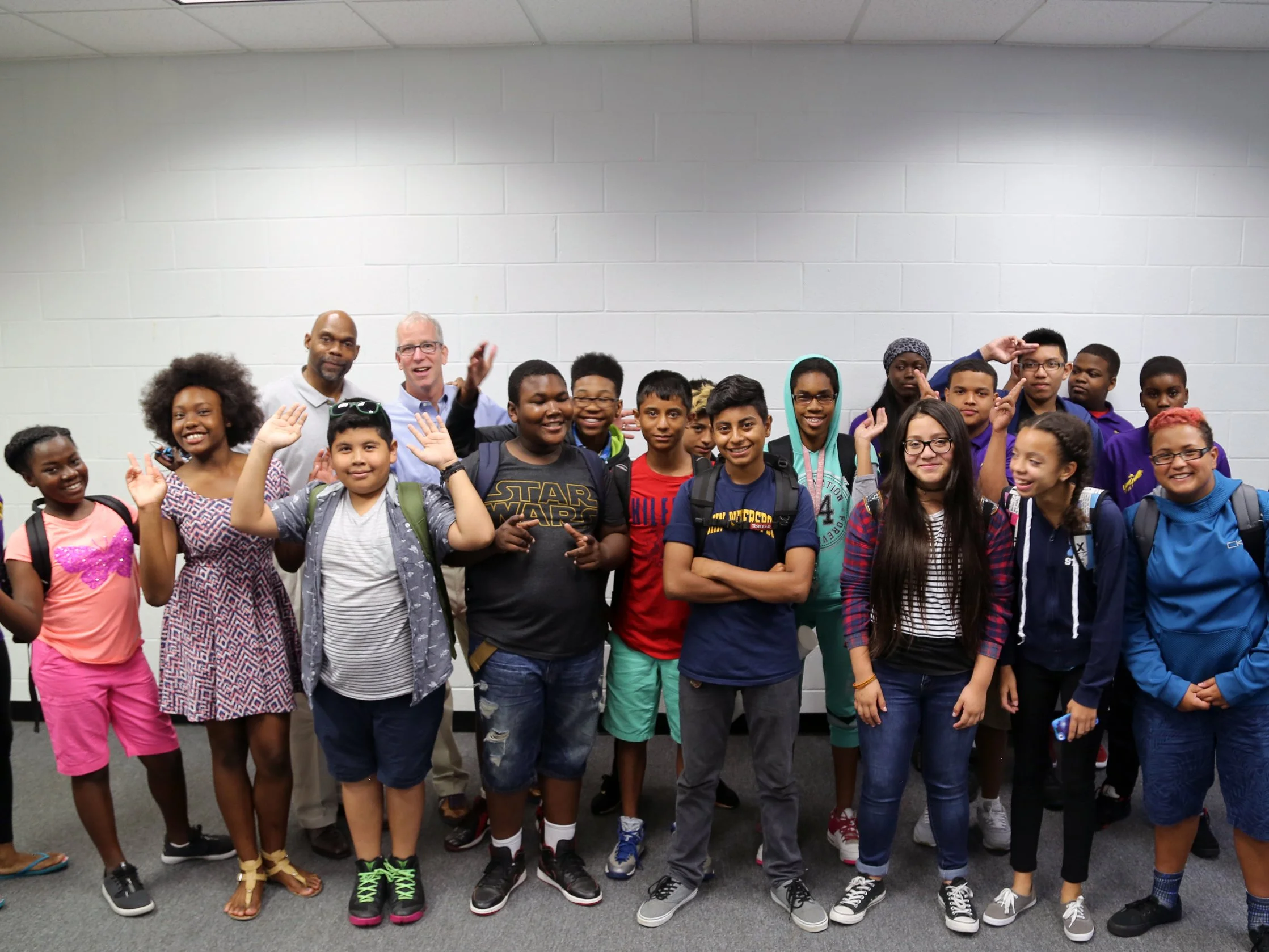 C.J. Meenan With Young Students.jpg