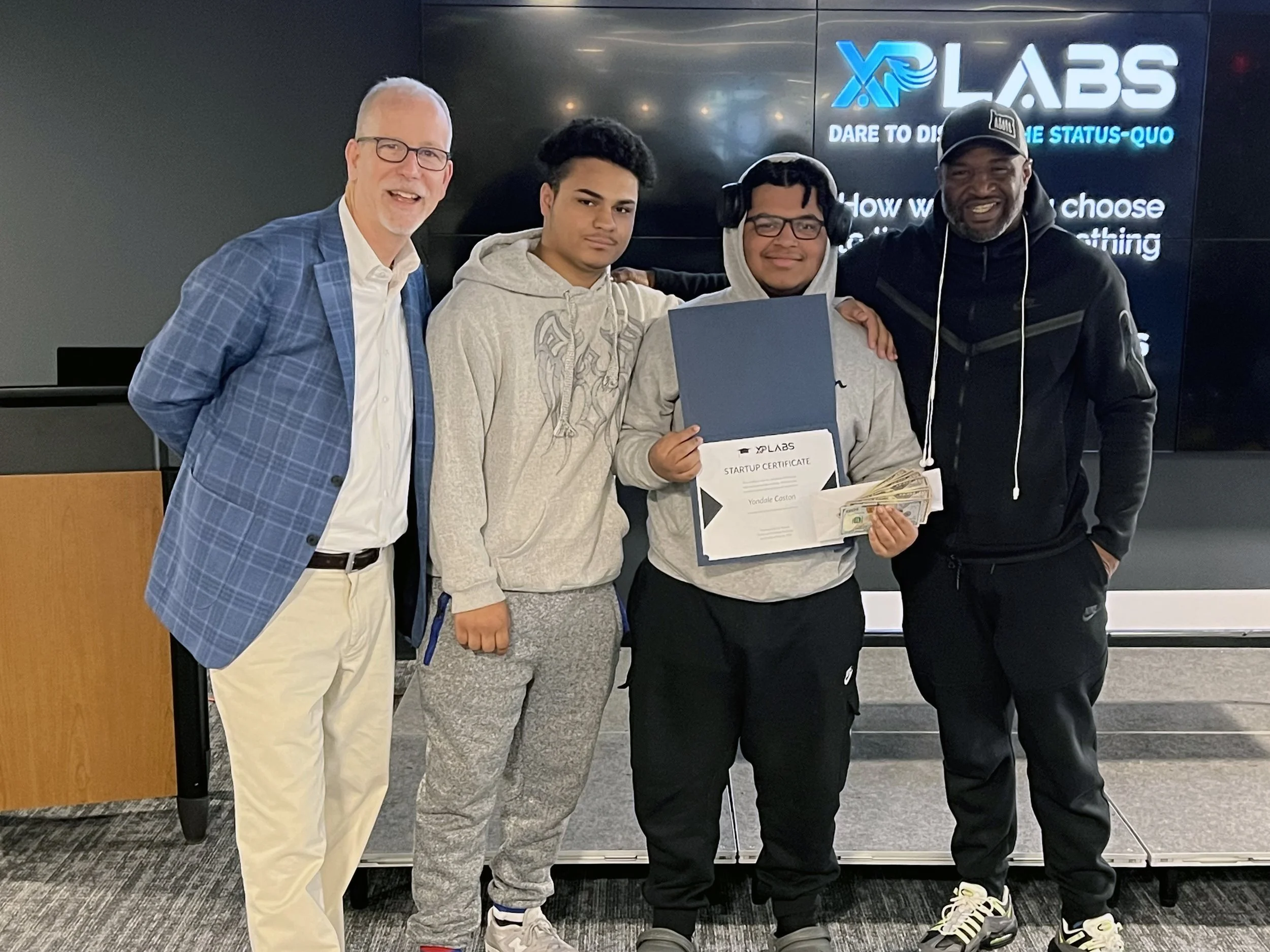 C.J. Meenan With Students.JPG