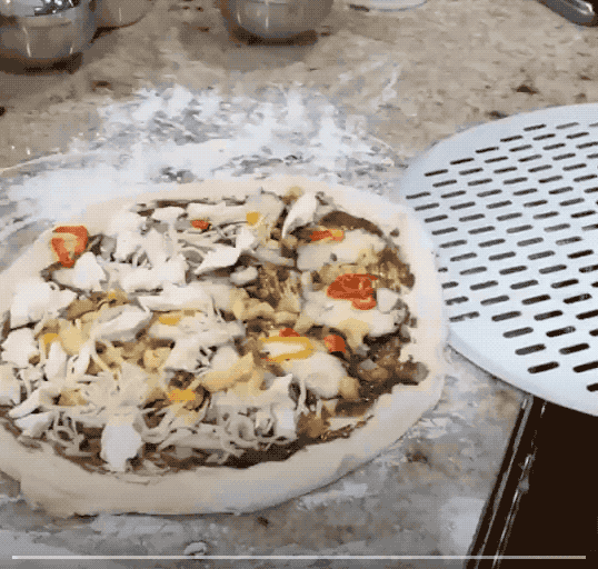 metal peel load a pizza