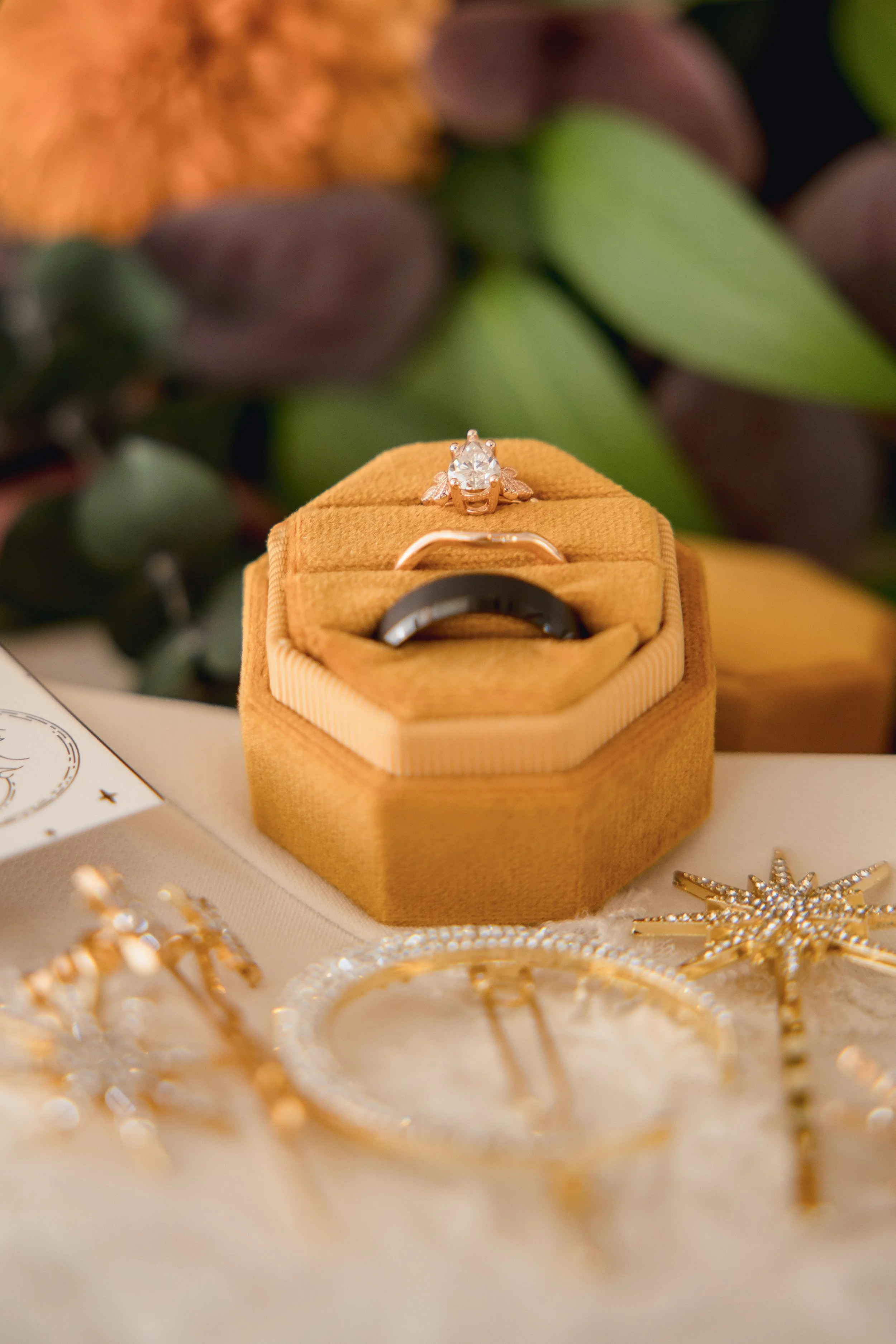 bride-and-groom-rings-on-invitation-suite-kansas-city-wedding.jpg