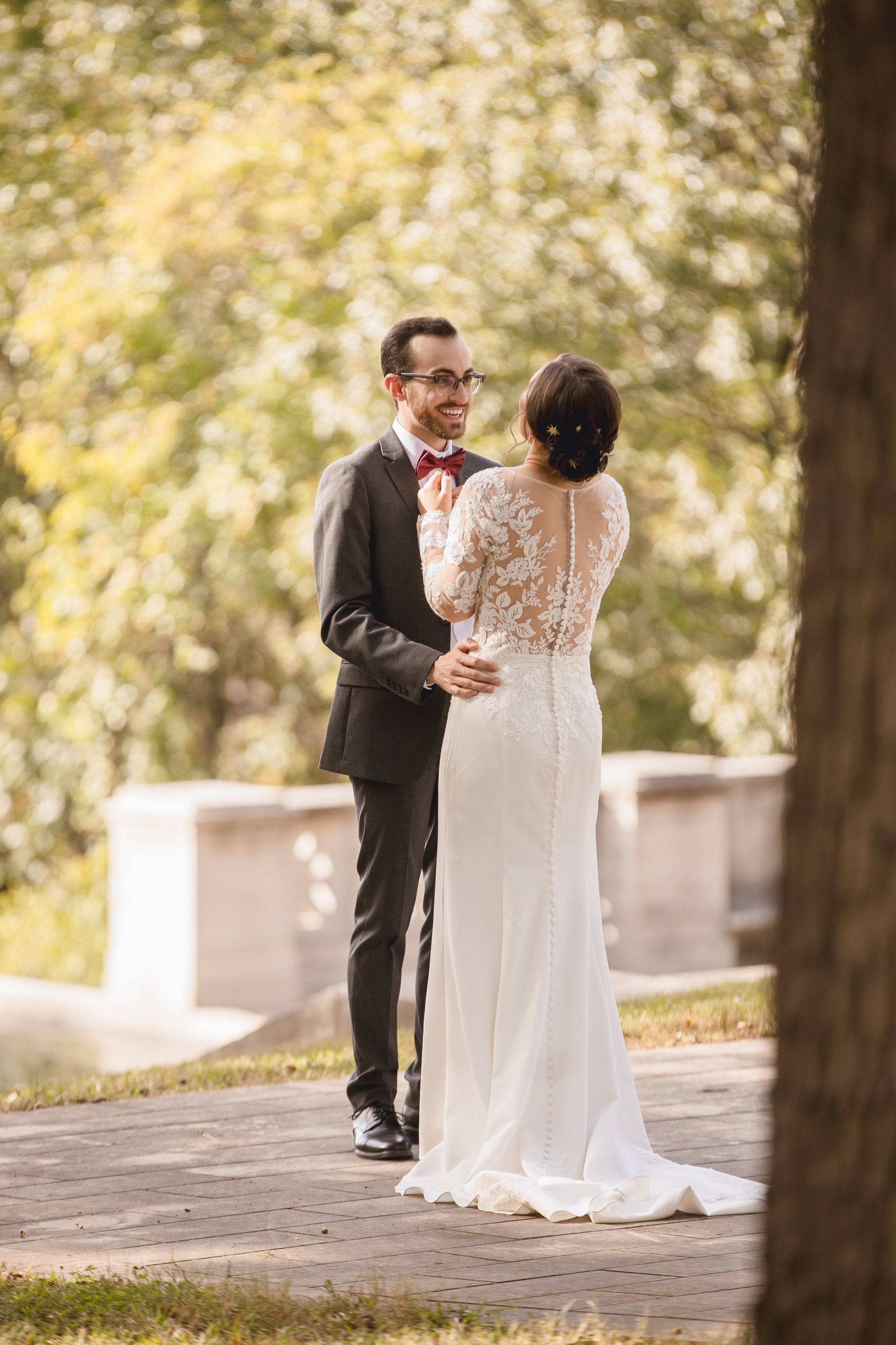 bride-showing-dress-groom-first-look.jpg