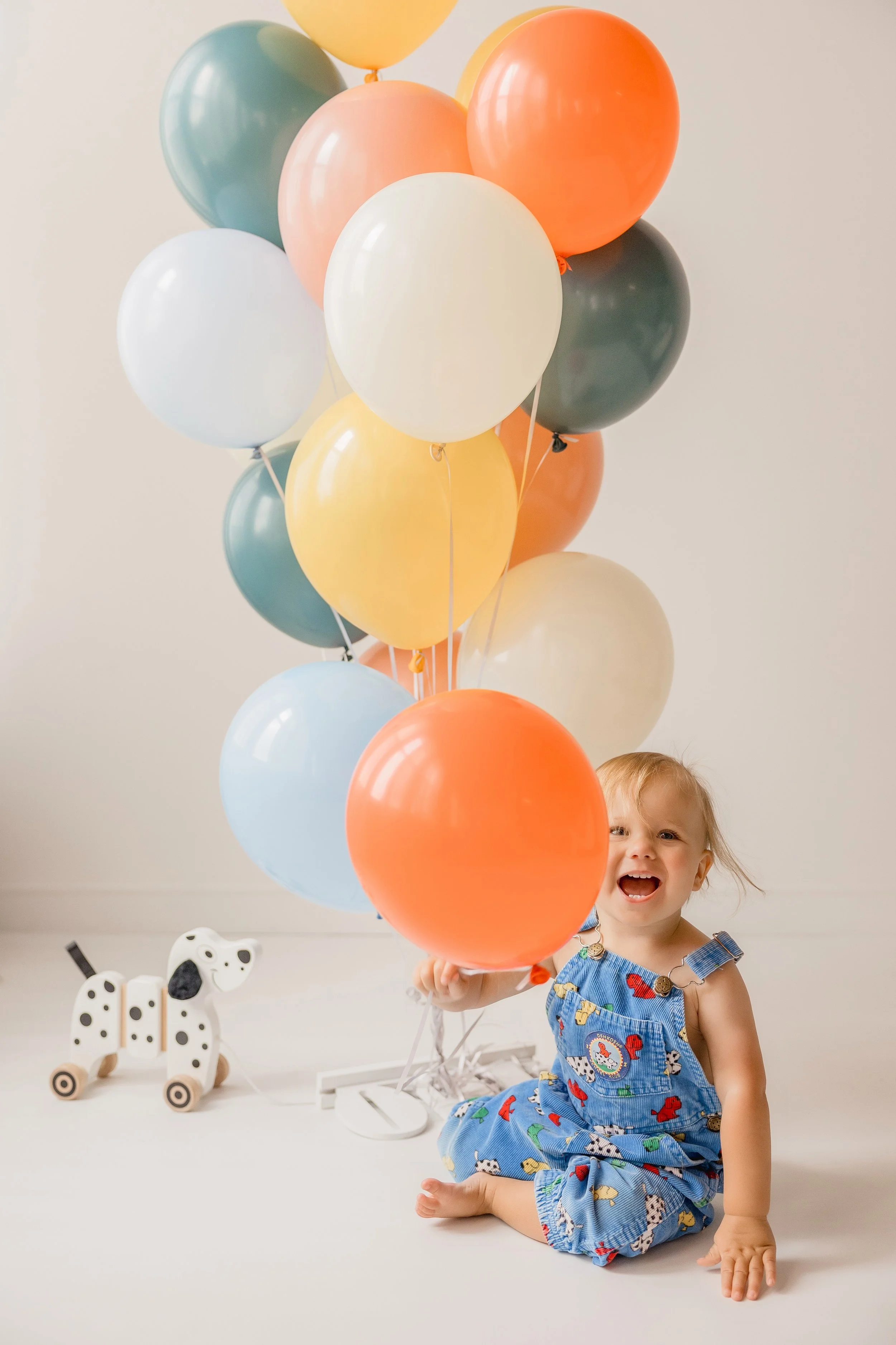 Bright balloons and an even brighter smile.jpg