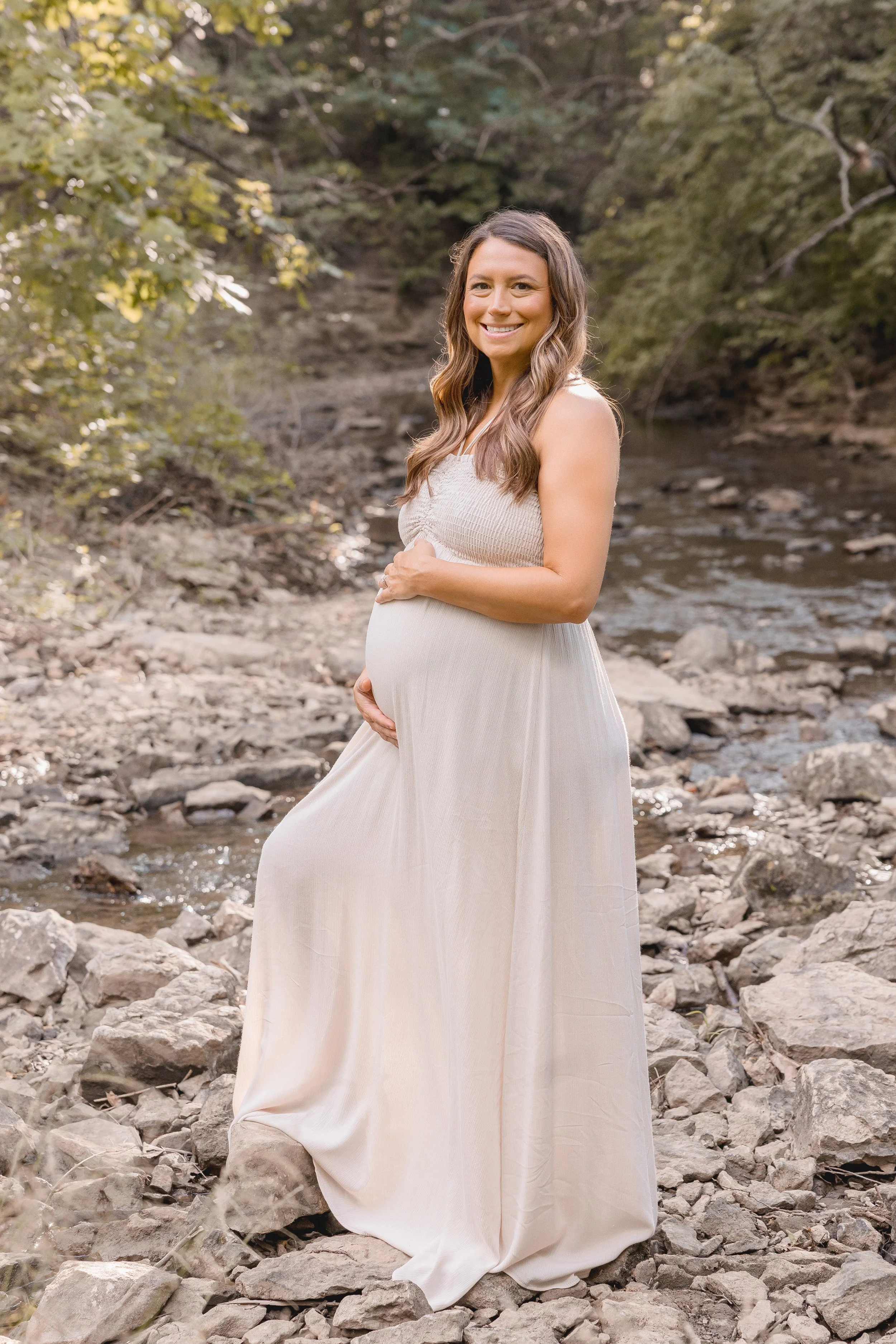 Scenic maternity portraits at Shawnee Mission Park, Kansas City photographer capturing full field view