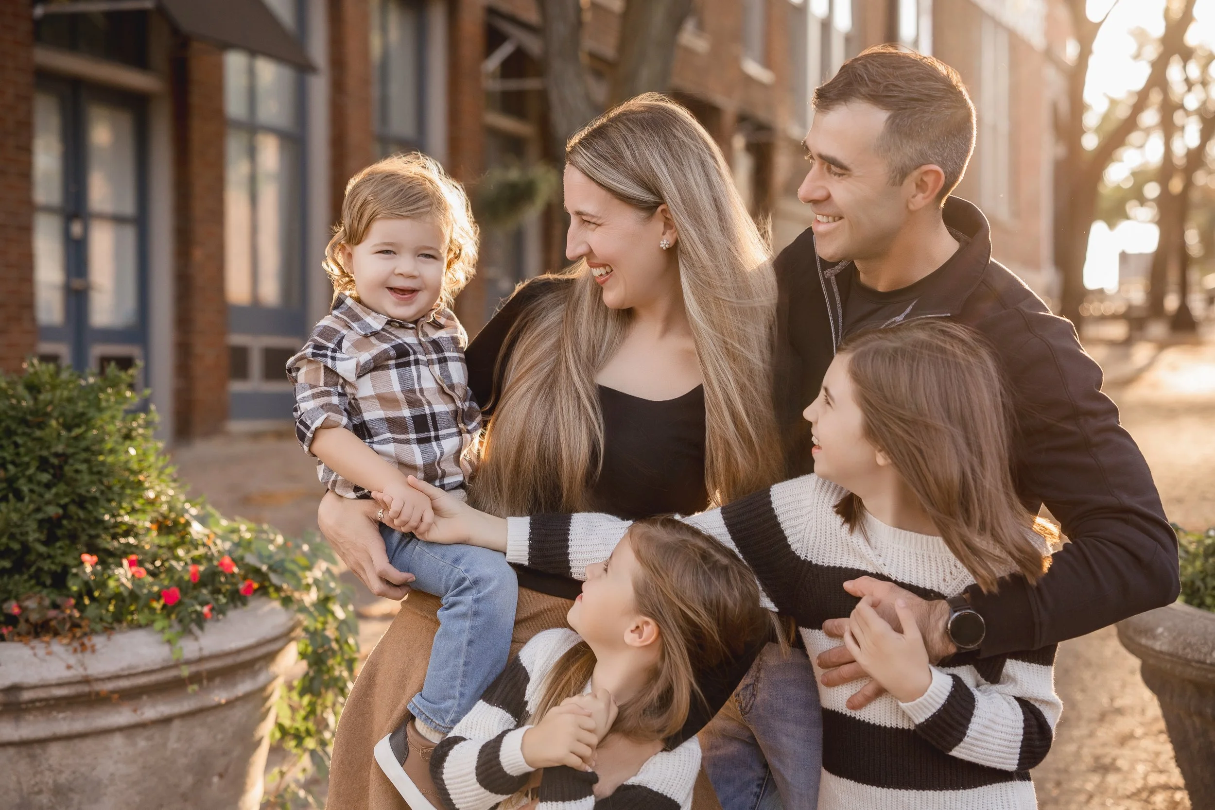 Kansas City family photography by Husband + Wife Photography capturing natural, connected moments outdoors