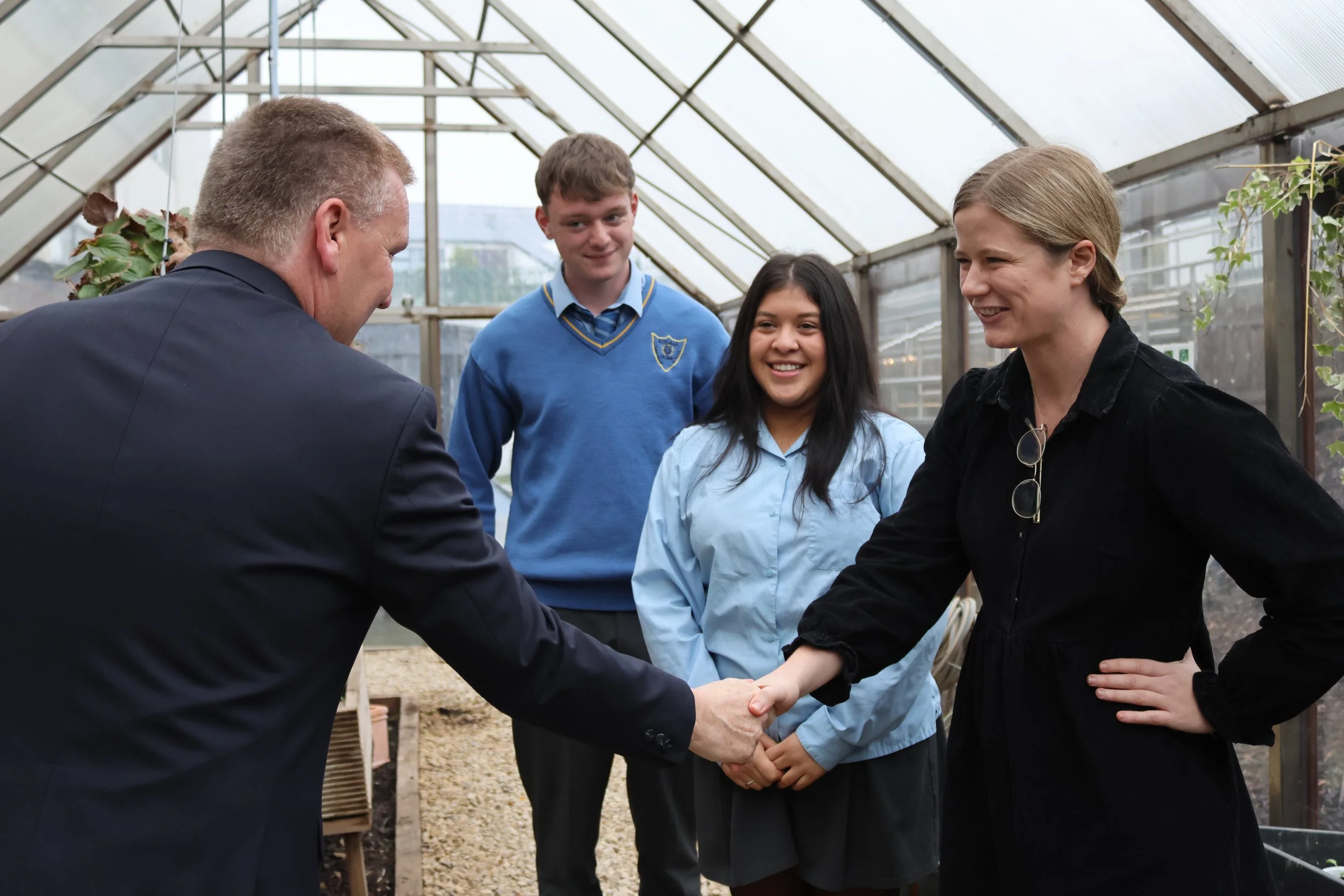 Commissioner Michael McGrath welcomed to the Outdoor Classroom at KCS by Ms. Aisling Hennebry, Jack Cronin and Juanita Kennedy.JPG