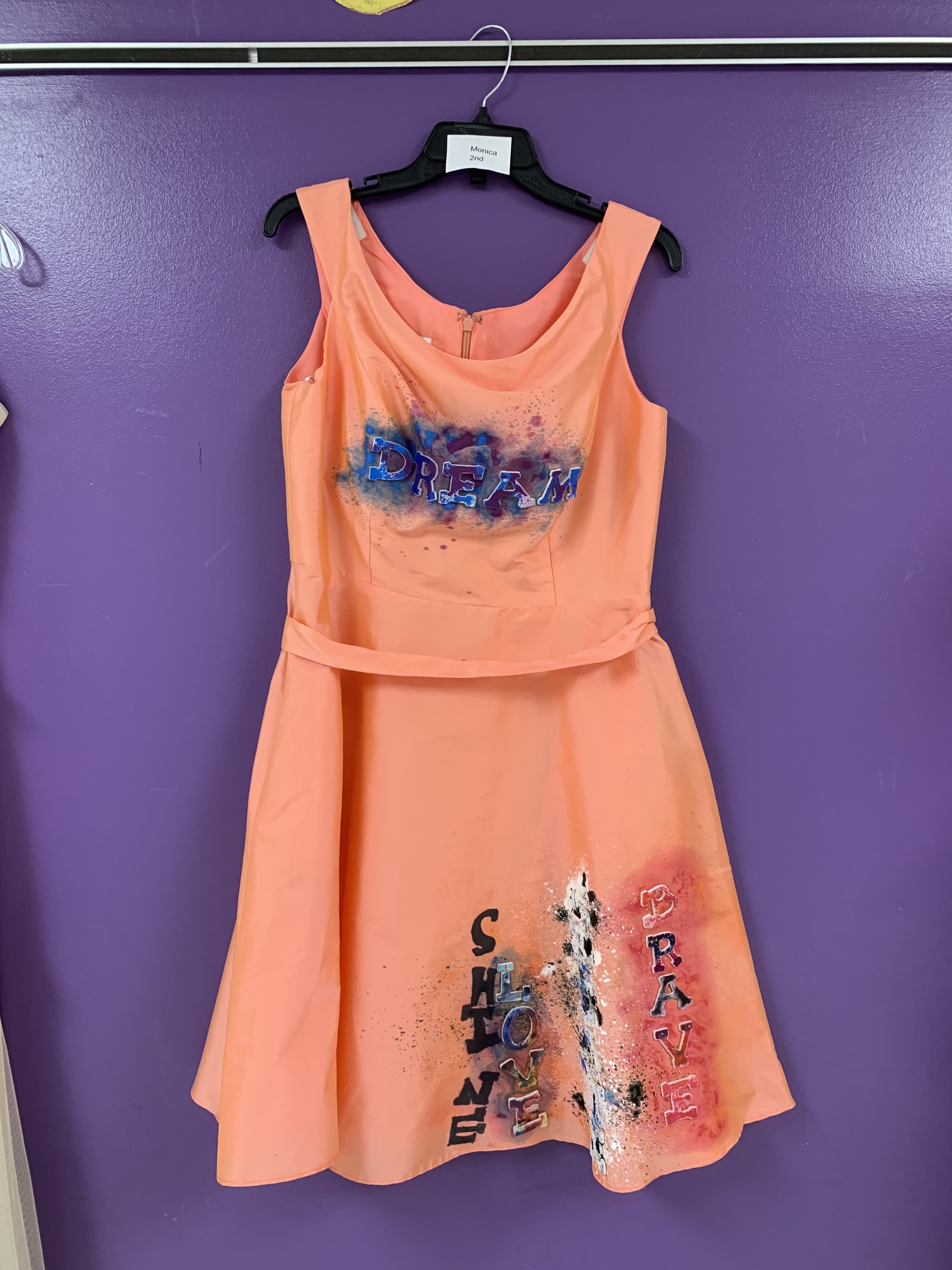 Elementary schoolers use dresses in art unit about Ann Cole Lowe