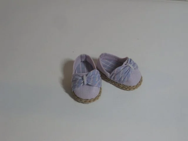 Rosette Slip ons