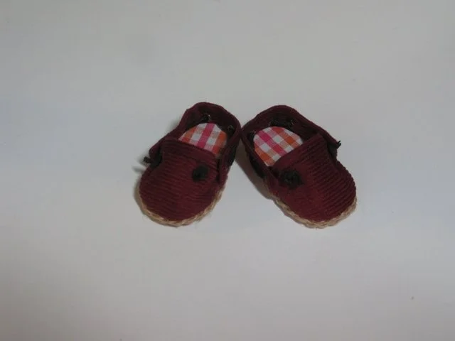Rosette Slip ons