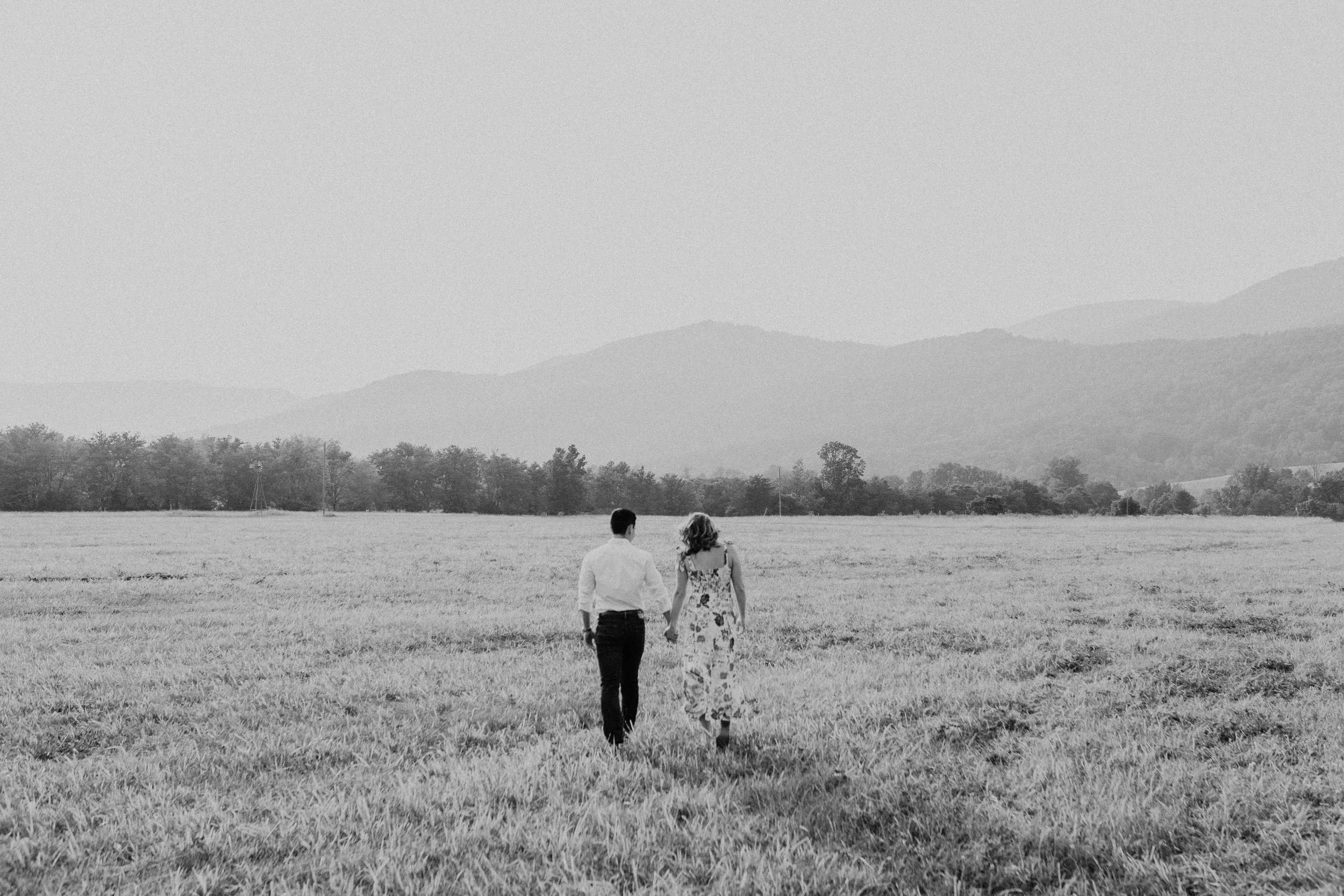 Jacqueline-Waters-Photography-Shenandoah-Valley-Summer-Mountain-Engagement-Gorgeous-white-and-blue-floral-Dress- (219).jpg