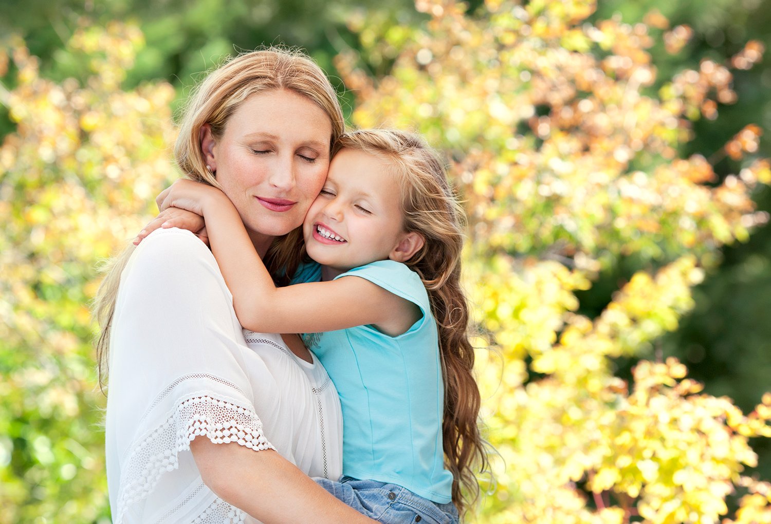 DHA_Mother_and_Daughter_Hug_Outdoors_2B-Final.jpg