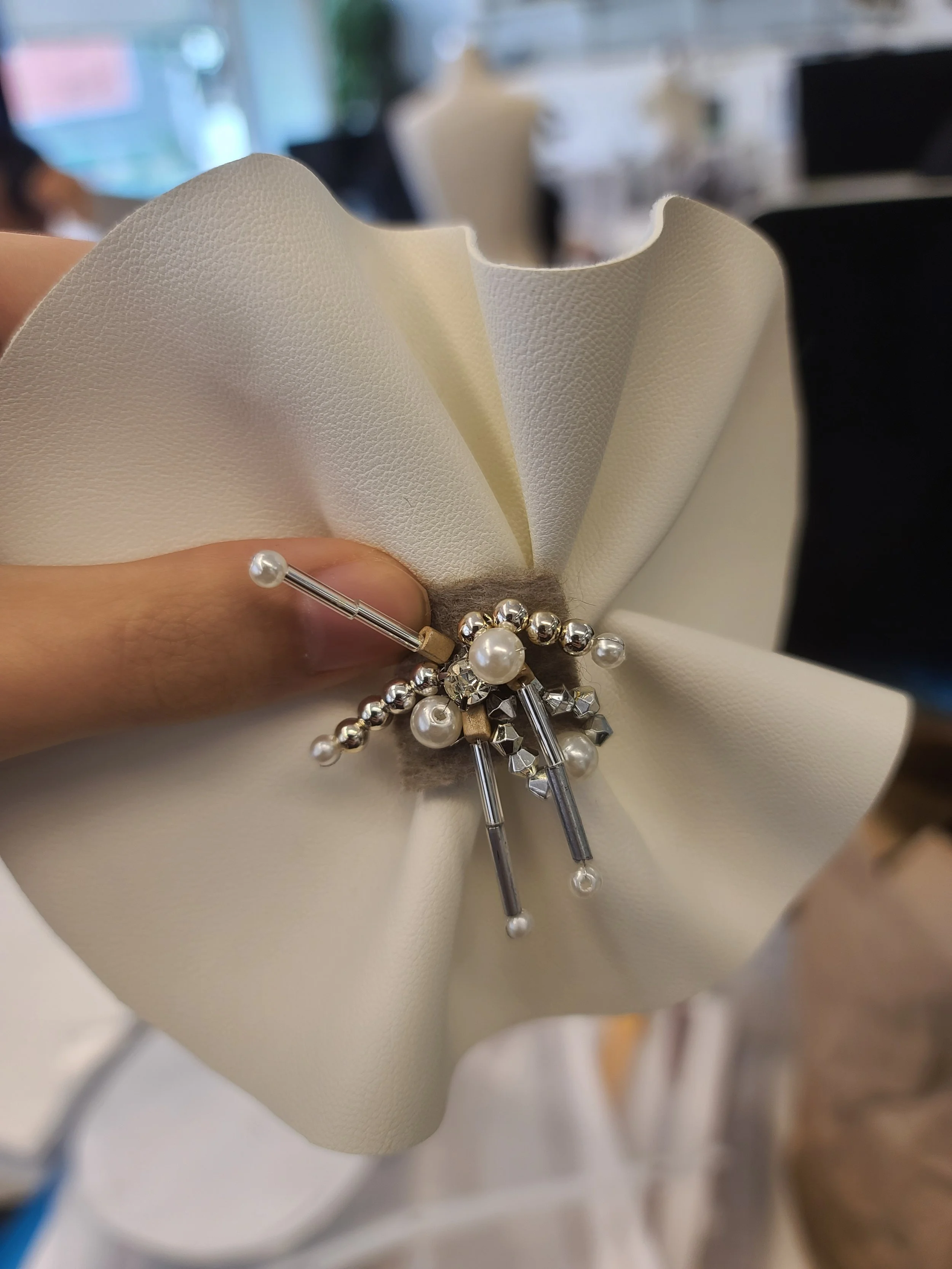  Here are multiple options of hand embellishments assembled by me for our Spring 2022 line. 