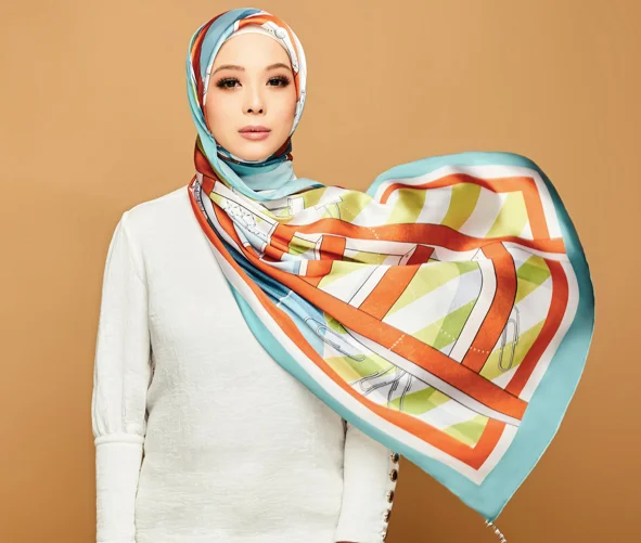 The dUCk Group founder, Vivy Yusof wears the Go-Getter ProdUCktive Scarf.jpg