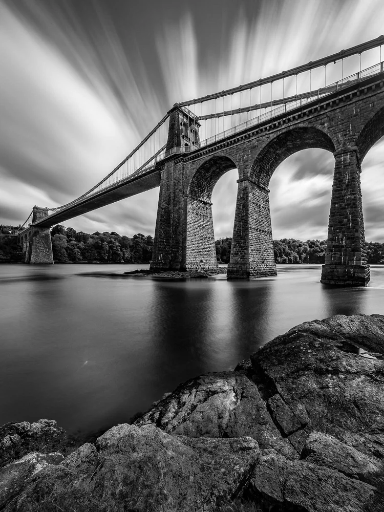 Black and white long exposure of a suspension bridge on Anglesey