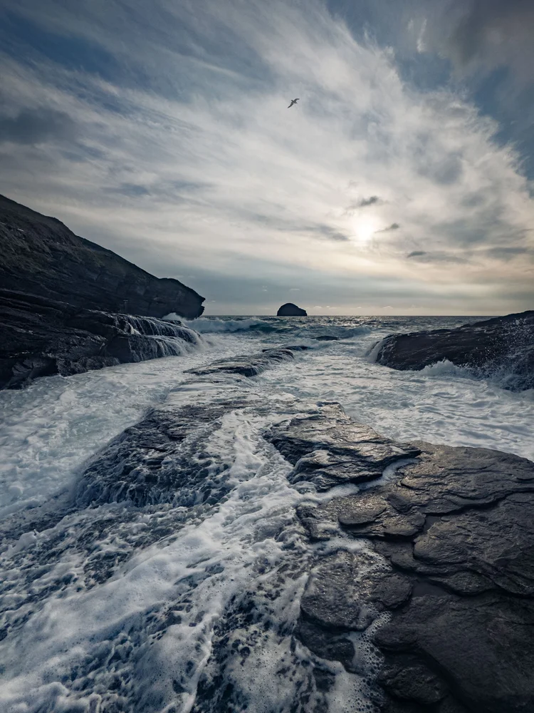 Waves pouring over the rocks at Trebarwith Strand, Cornwall