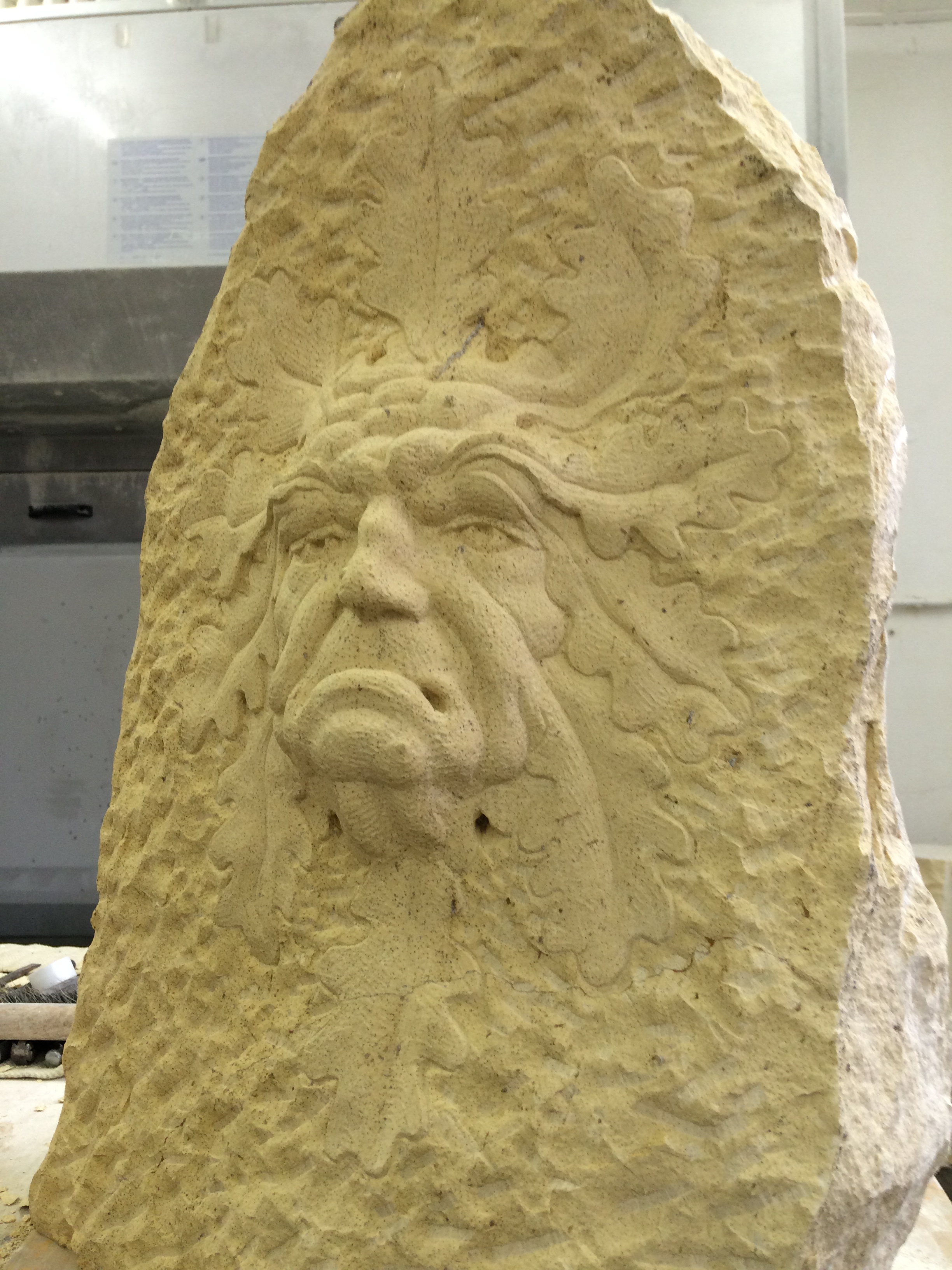 Ugly green man in Tadcaster Limestone