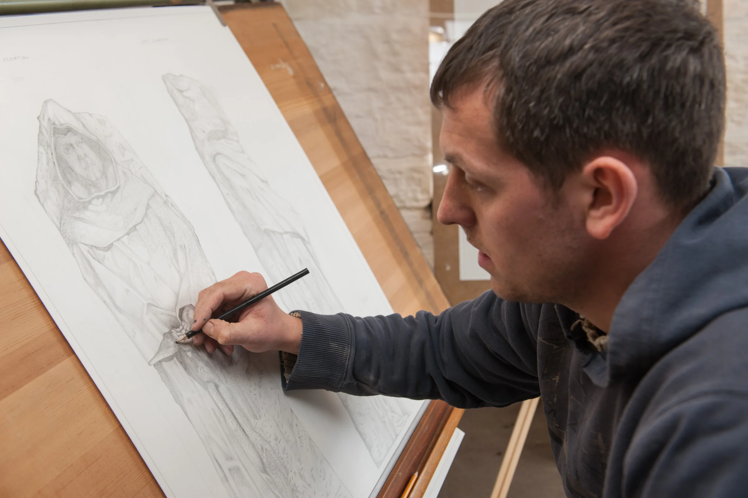 Joseph drawing the monk - photo by Paul Harris