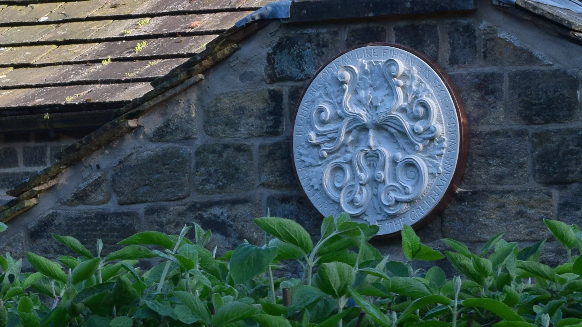 Green man roundel in Clad frame