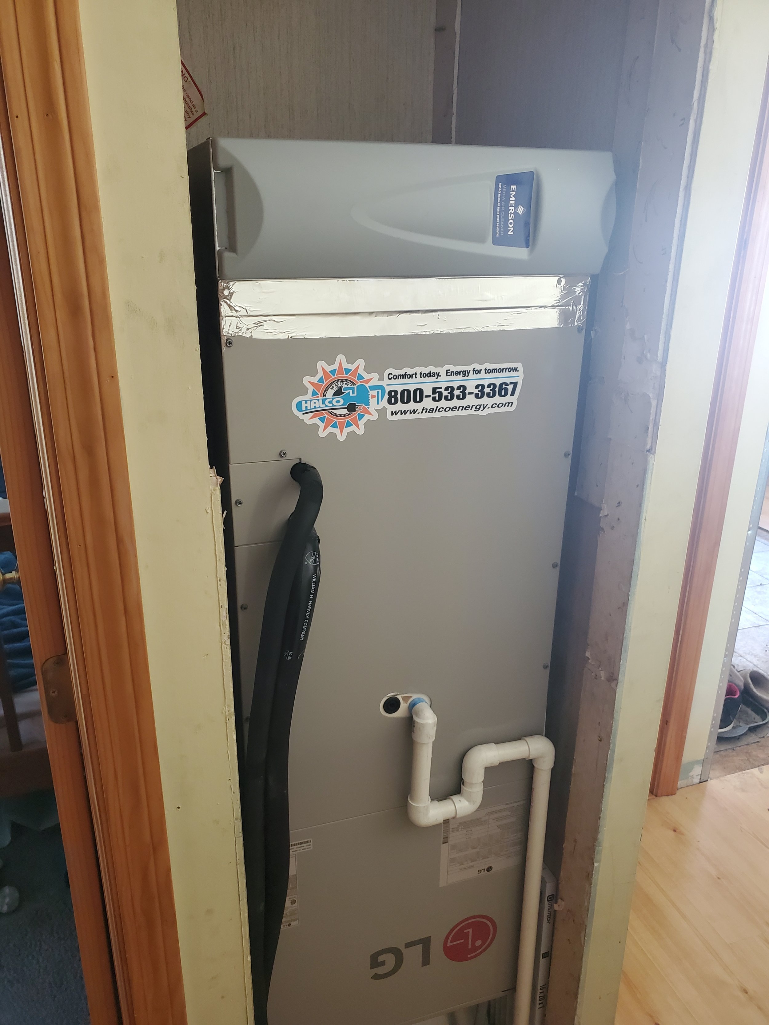 Mobile home ducted retrofit of air source heat pump