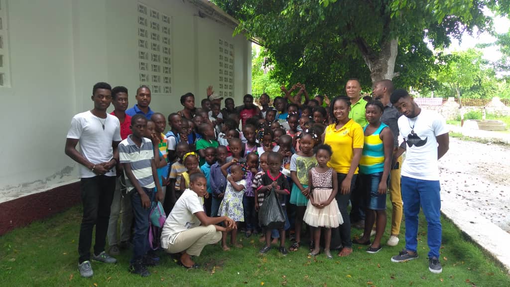 Darline (front) with participants of the summer camp