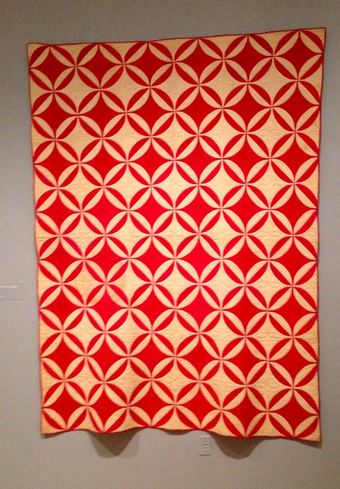 c. 1850 cotton quilt, mounted vertically