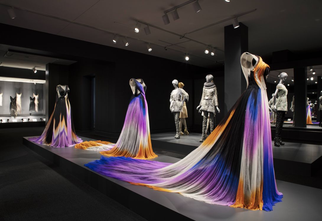 Gowns mounted invisibly on custom constructed plexiglass torso forms