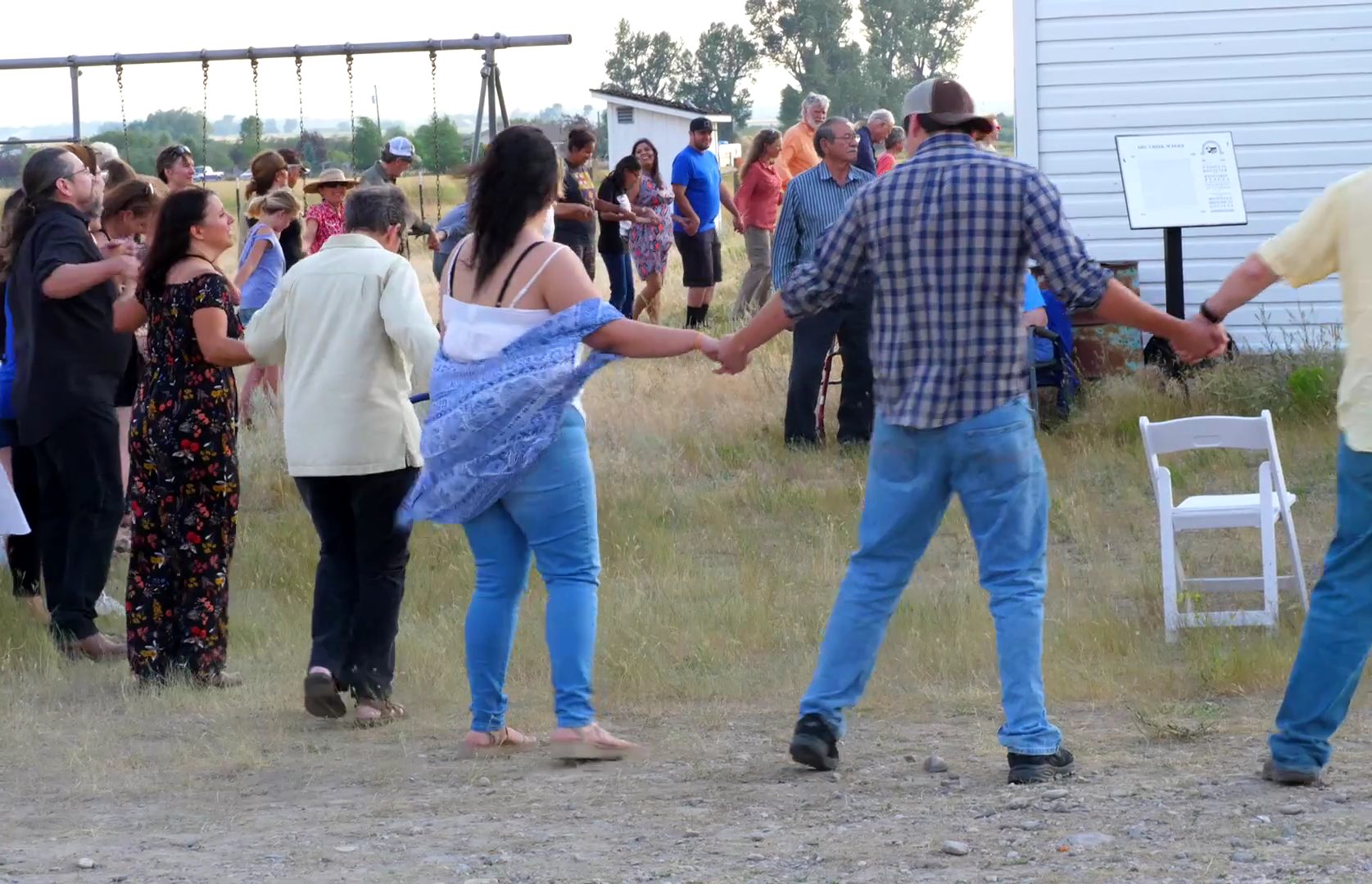  Guests joined hands and did a Native American circle dance during the opening of the installation. 