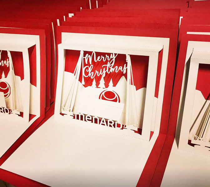 We designed, laser cut, and assembled an order of 500 pop up cards for Menard (rigging).