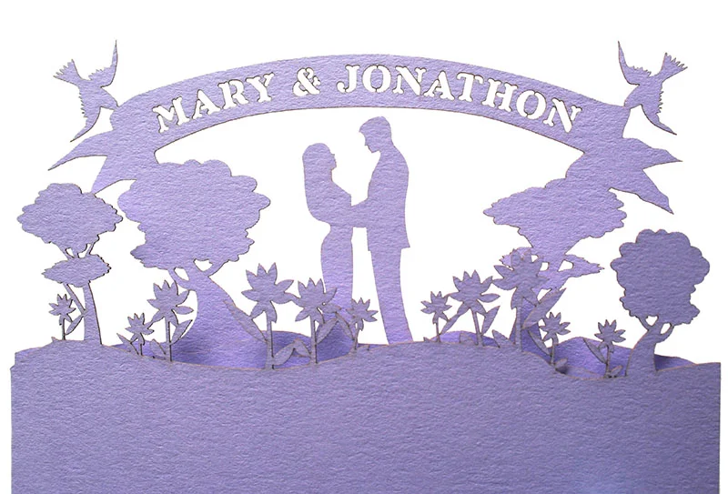 Detail of a custom laser cut wedding invitation we made for a wedding planner.