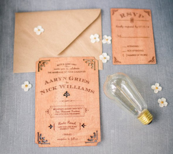 An elegant wood engraved wedding invitation.