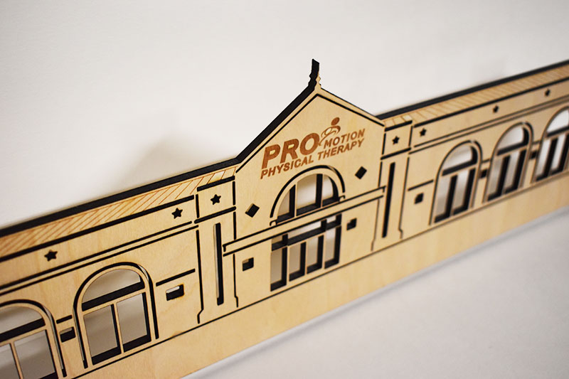 We can make a laser cut wood model of your business or home!