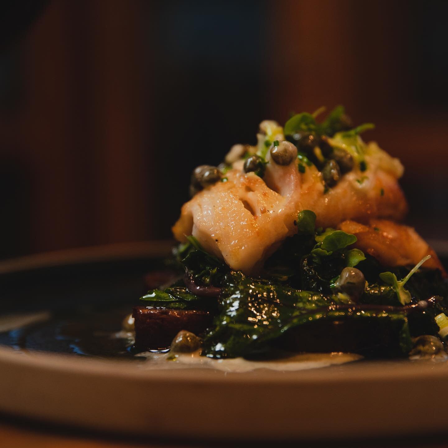 Looking for a light dinner tonight? Enter Butter-Poached Sablefish.
Served with purple potatoes, wilted kale, caper and leek beurre blanc.

Full menu available at the link in our bio.