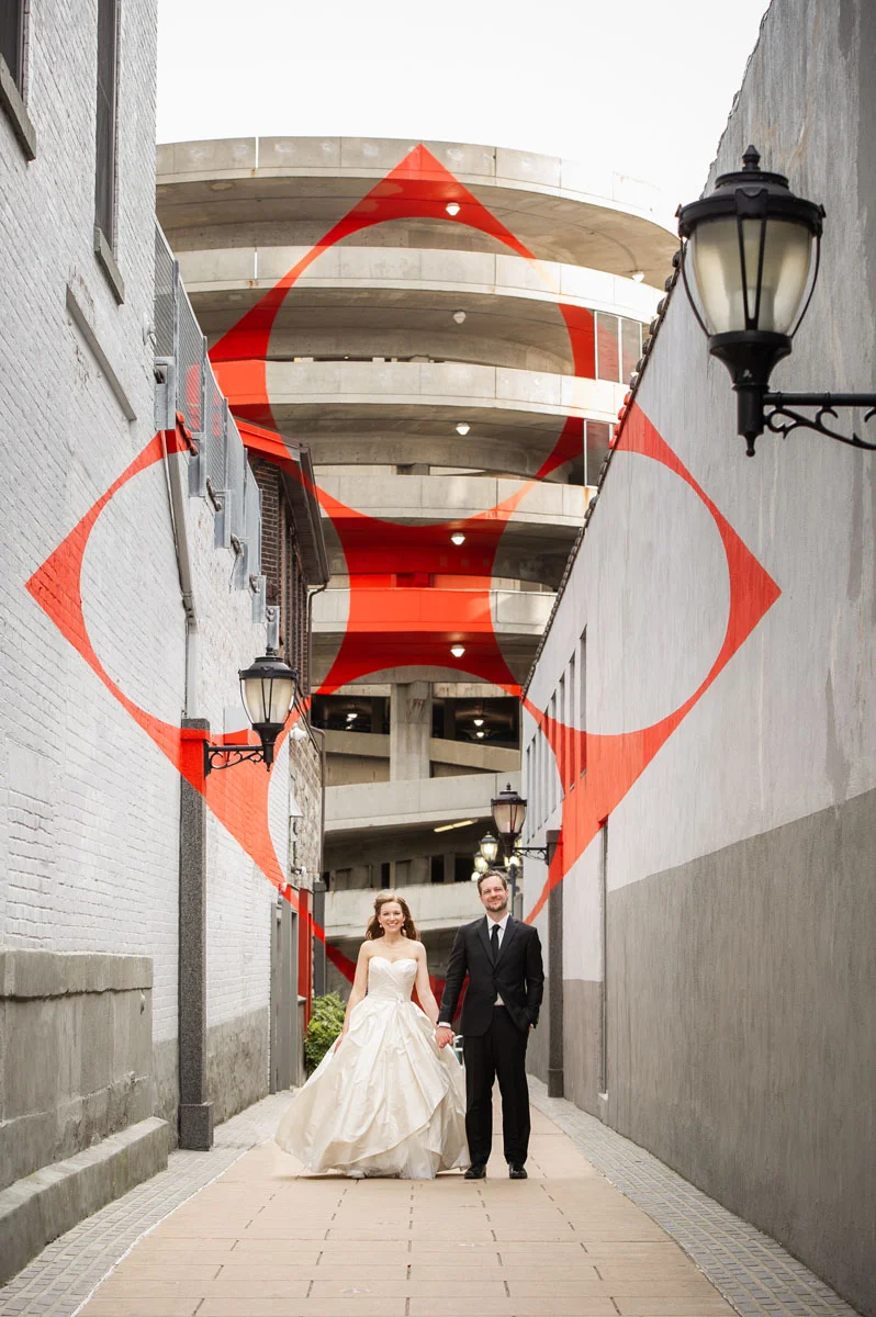 Downtown New Haven features this alley with a design titled “Square with Four Circles” by Swiss artist Felice Varini.