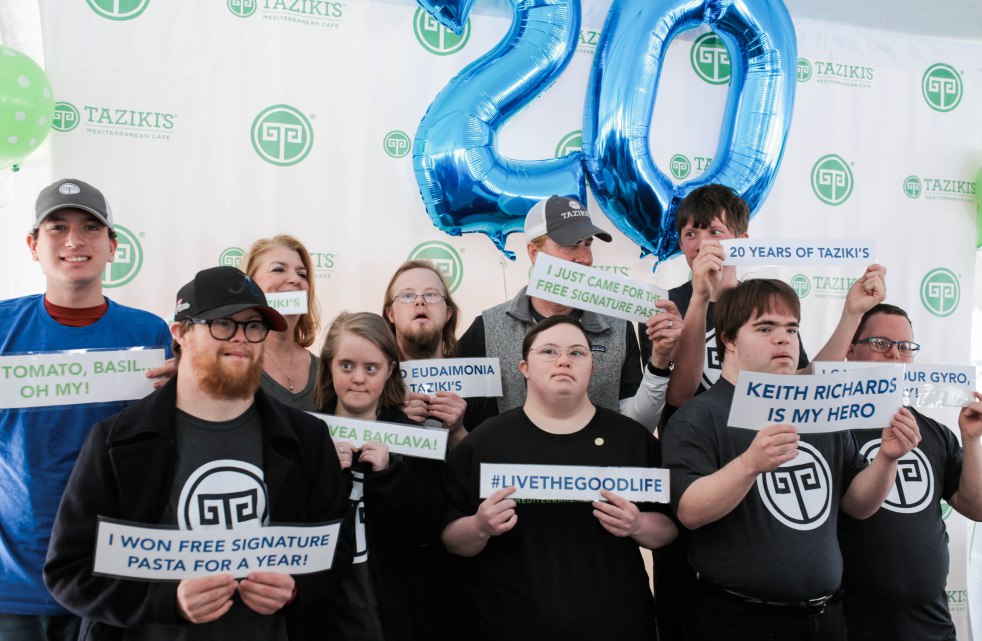 Employees from almost all of the Birmingham locations celebrating 20 year’s of Taziki’s!