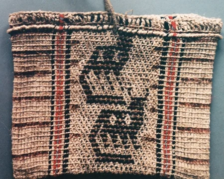 Back of a hemp and wool twined and netted bag
