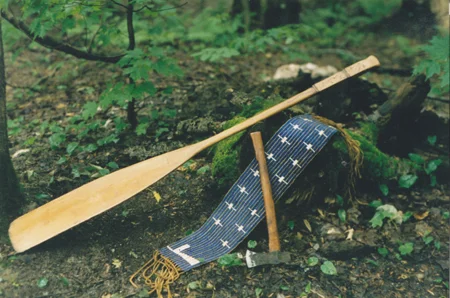 Handmade maple paddle canoe with carved handle, 6 inch wide by 34 inch wampum belt, and trade hatchet