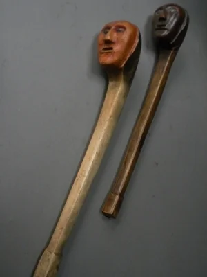 Overhead view of carved wooden clubs