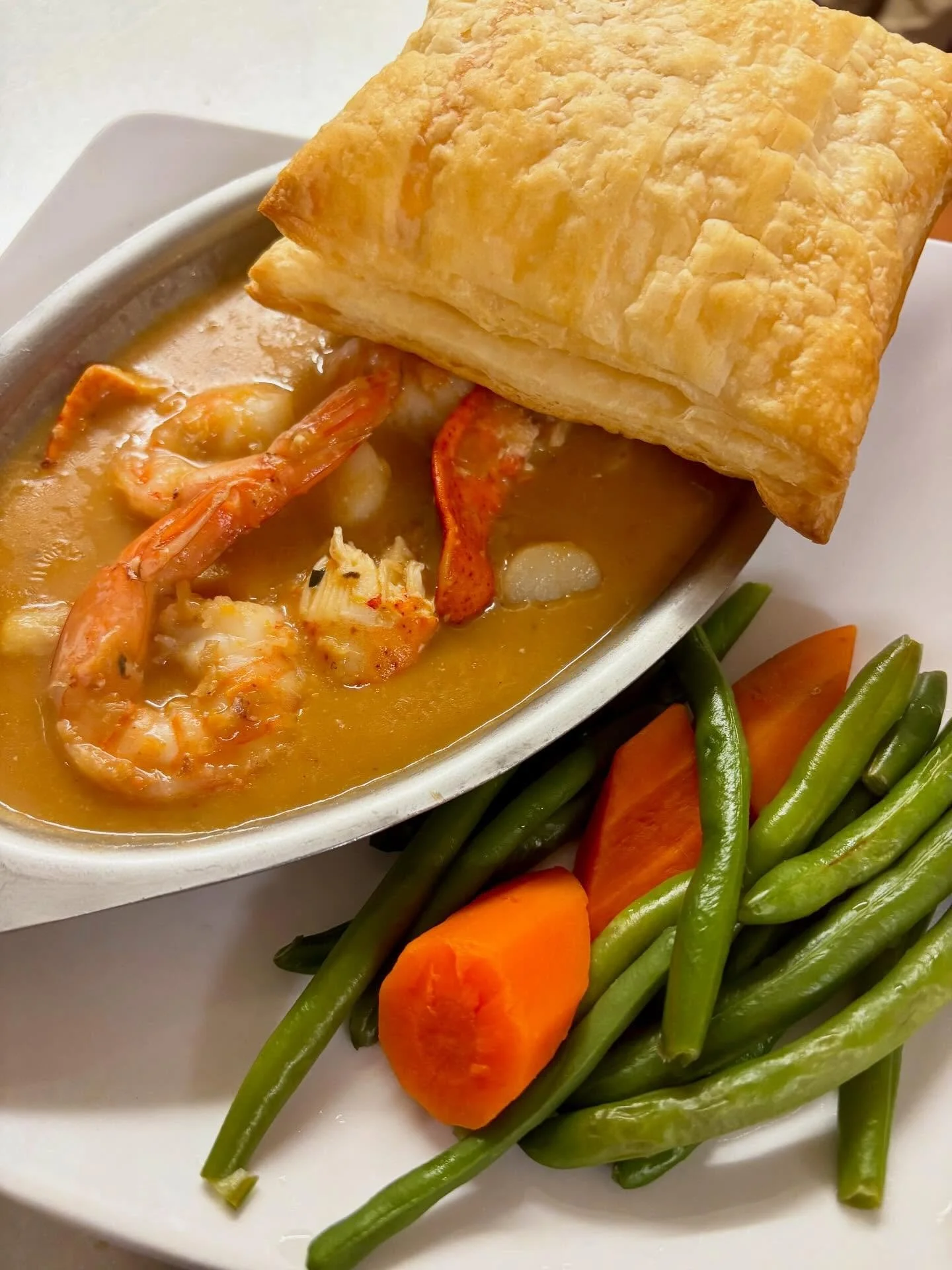 Seafood Newburg!  Maine Lobster | Scallops | Shrimp | Seafood Veloute |  Puff Pastry |. #tiffanystapandgrill