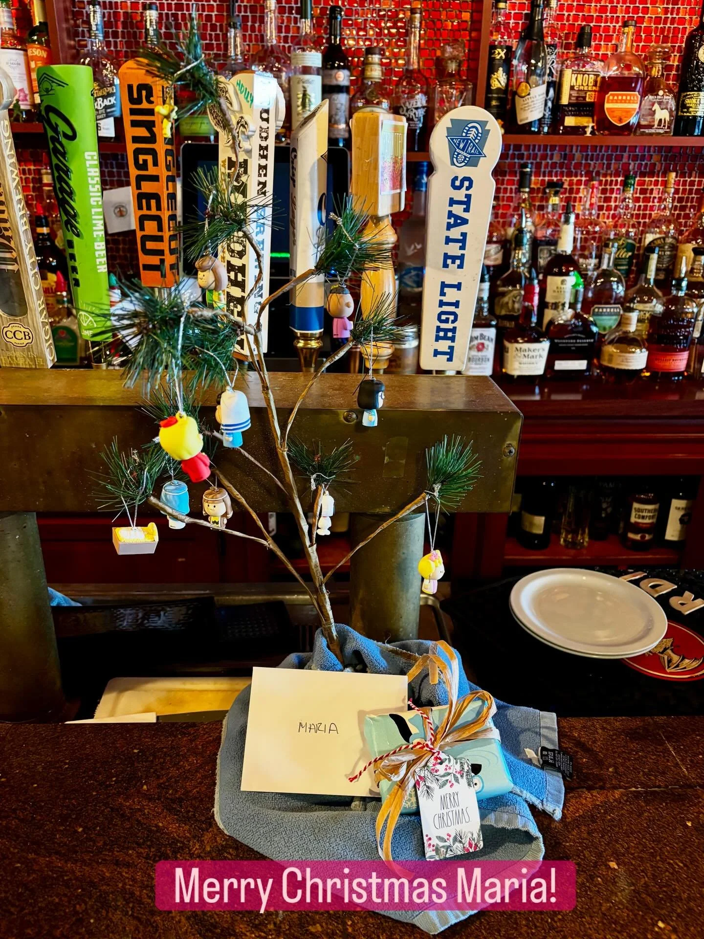 It&rsquo;s is suggested that presents for your favorite bartender Maria @mrf419 be left under the Charlie Brown Christmas Tree. #tiffanystapandgrill @charliebrownchristmaslive