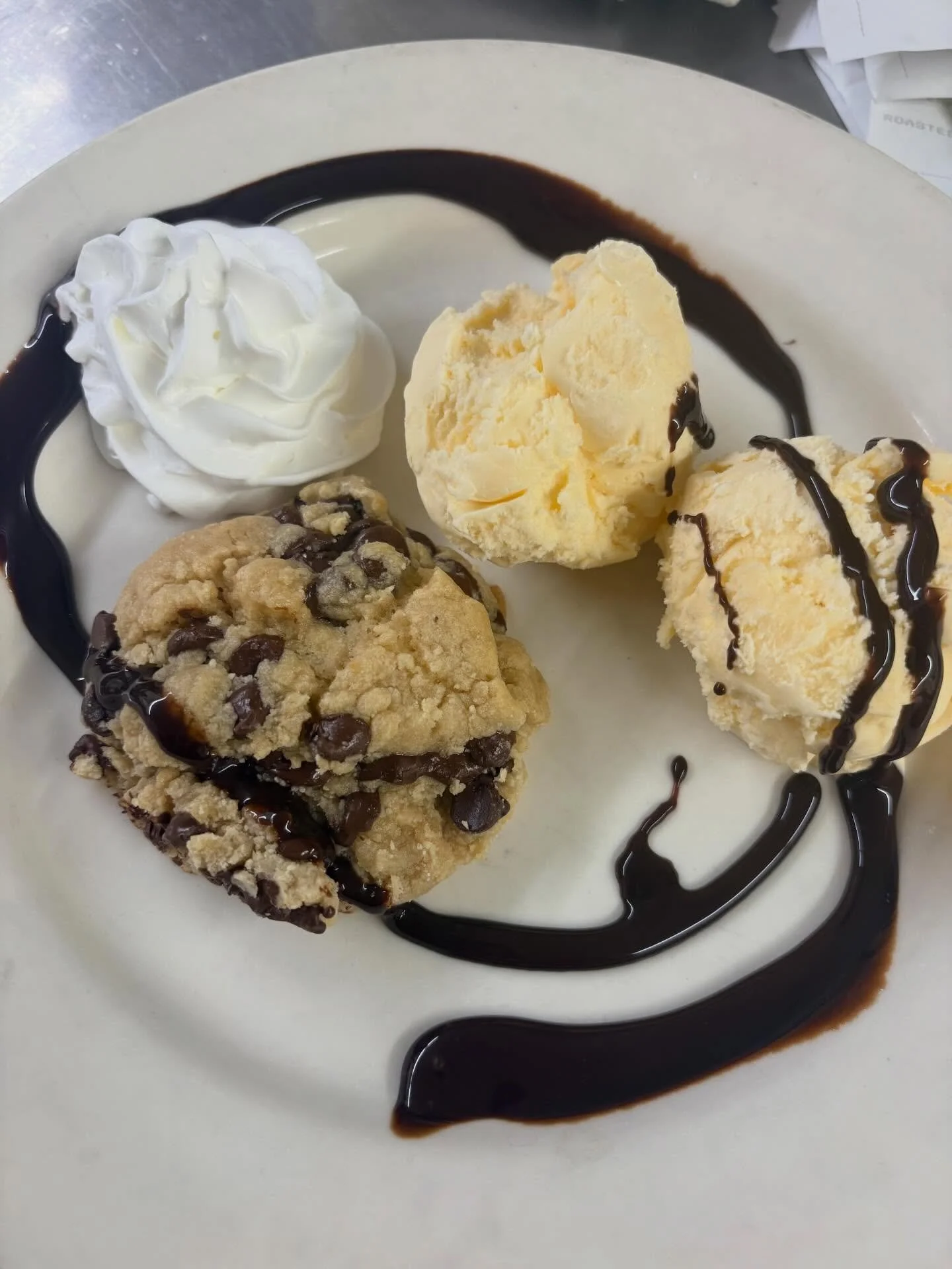 Giant Chocolate Chip Cookies.  Baked or warmed with hot fudge and vanilla ice cream. #tiffanystapandgrill