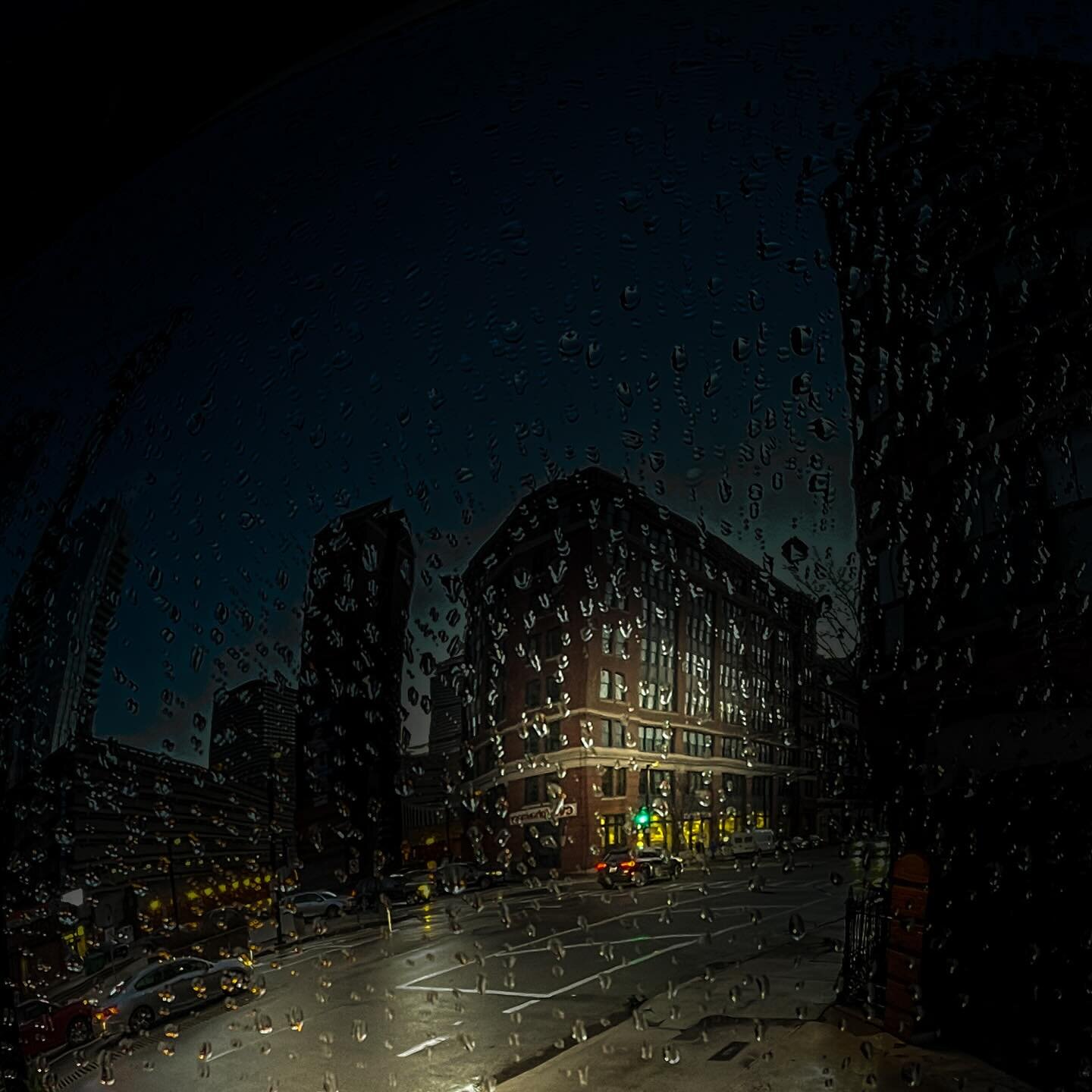 Boston in the Rain: A mirrored perspective! The raindrops add a beautiful texture to the cityscape, creating a serene and almost surreal view. 🌦️🪞 #BostonBeauty #RainyMood