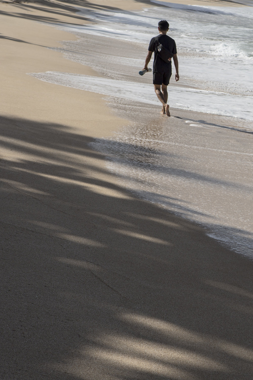 Victor Ving walking Beach in North Shore