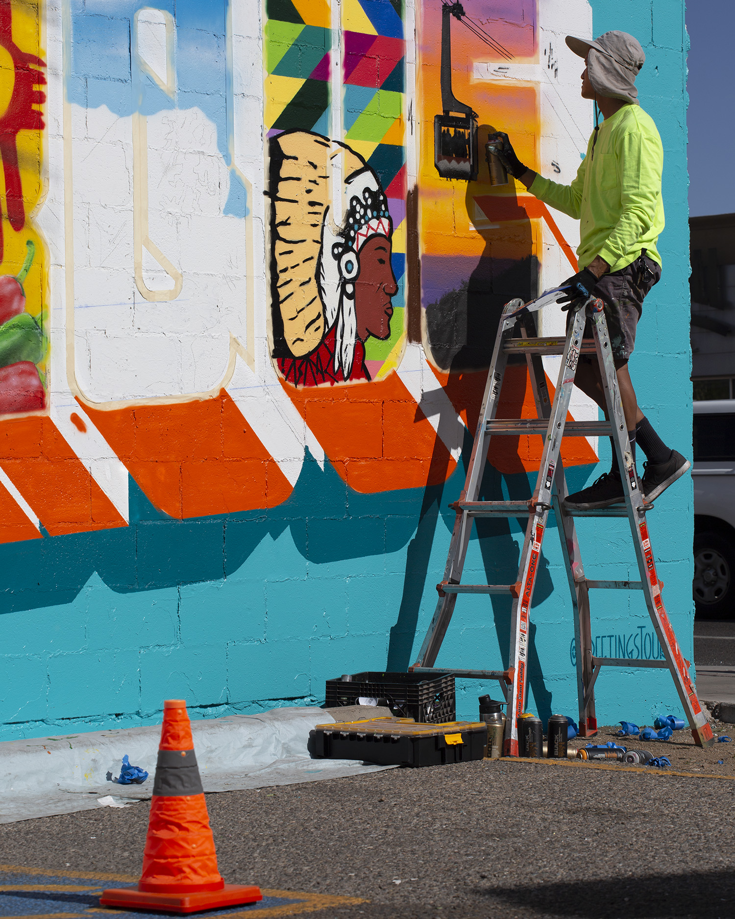 Albuquerque Street Artist Paints Postcard Mural