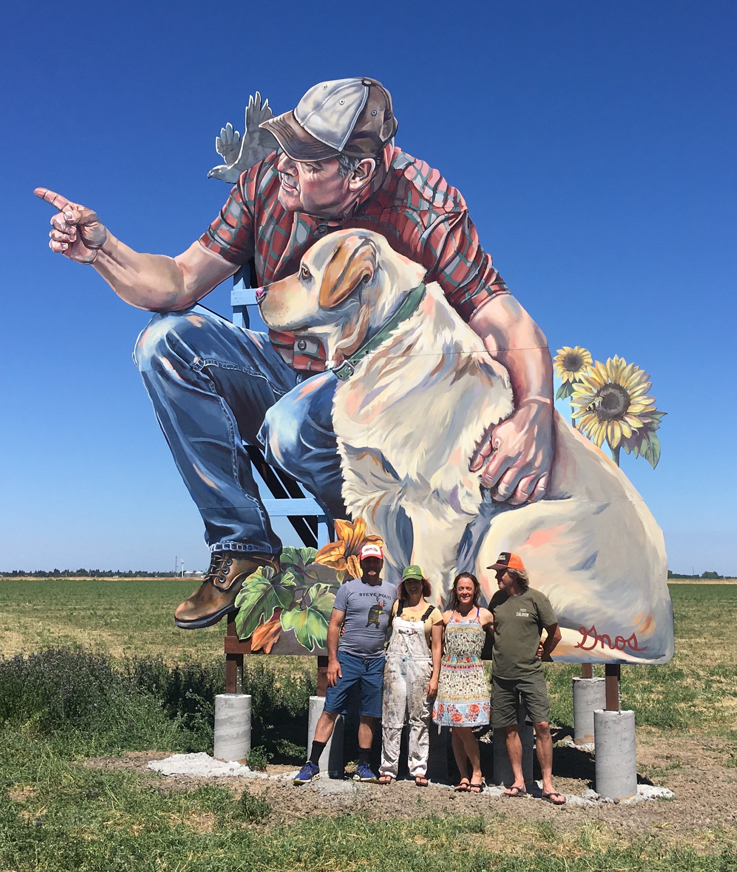 The finished product: 20x20' free standing mural, "Stewards of the Soil" Pictured above: Che Miller, Colleen Gnos, Sally Lamas and Gregory Steers