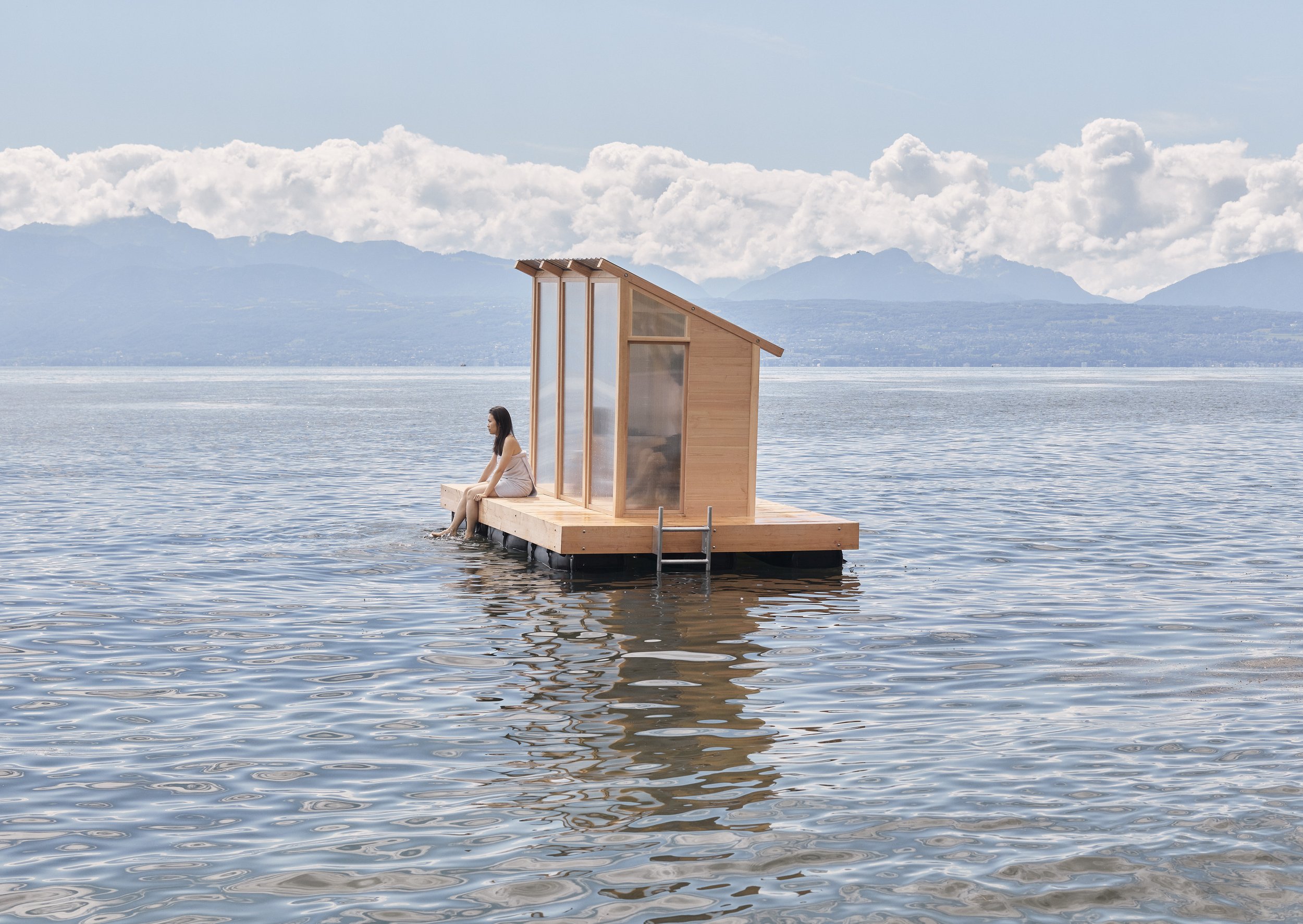 This Floating Sauna in Switzerland Lets You Steam, Plunge, and Repeat Dwell Photo by Noé Cotter