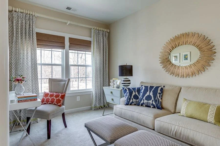 In a room that gets daytime sun, this lamp is well-placed for nighttime reading
